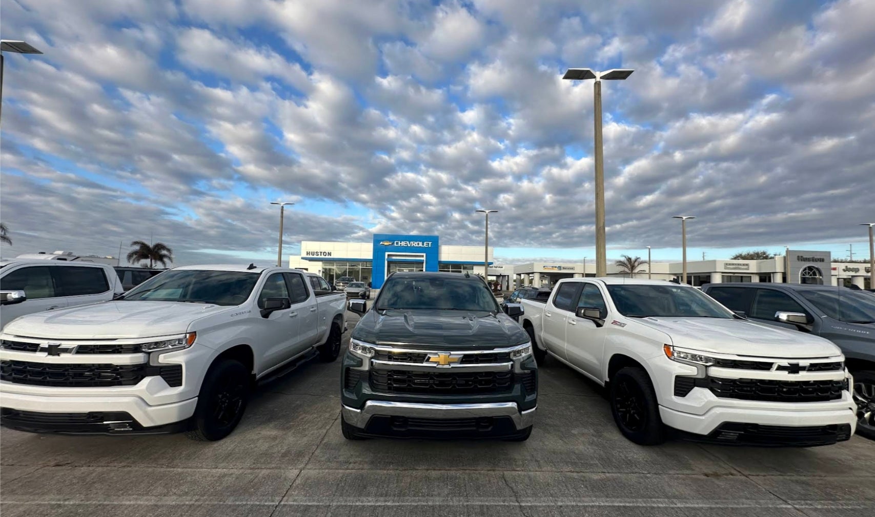 New Chevrolet trucks and SUVs on the lot at Huston Chevrolet — serving Central Florida